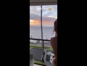 Bella Thorne topless balcony view