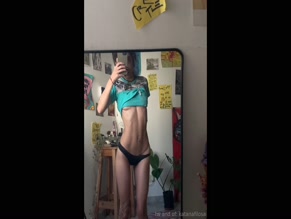 katanafilosa Shirt lifted, revealing breasts and belly while wearing panties.