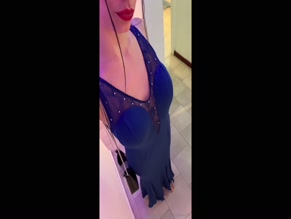 Tannitaxxx26 blue dress cleavage reveal