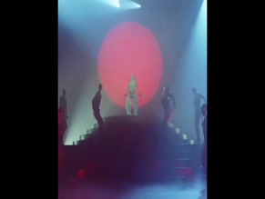 Miley Cyrus midriff exposed