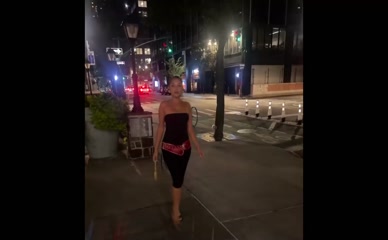 Jaylen Barron walks on a city street.