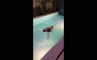 lindaloven floats in pool bikini visible