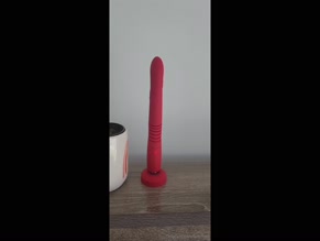 Flirtyfloss's Red Dildo Vibrating on Charging Base