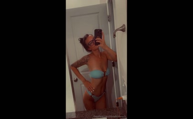 lifesafkinbeach: Breasts and genitals fully obscured by bikini.