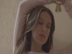 Millie Bobby Brown topless tease.