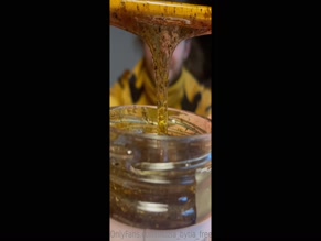 illuzia_bytia_free stirring thick substance in jar