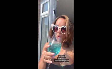 Georgia May Foote topless poolside drink.