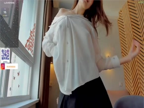 bellacaress: Partial breasts visible under unbuttoned top.
