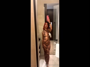 Regina_Unite explicit partial body exposure in leopard print