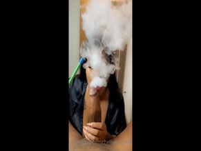 michellewalker000 smokes hookah while holding a cock