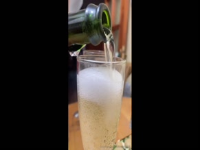Pouring champagne.