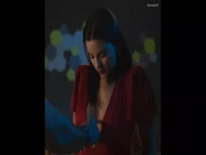 Maite Perroni cleavage slip red dress
