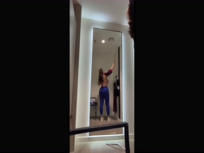 Alexandra Volkov changing clothes and exposing her boobs
