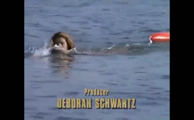 Yasmine Bleeth's Tits and Ass in Baywatch Swimsuit