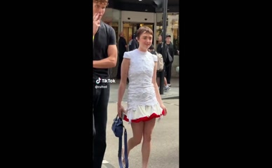 Maisie Williams street candid dress lift.