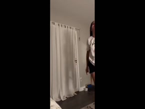Isabela Merced00:00 bending over and provocative squatting in athletic shorts.