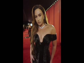Demi Lovato's Cleavage in Black Dress