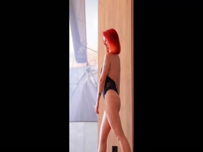Angie Strangie in black lace bodysuit shows ass