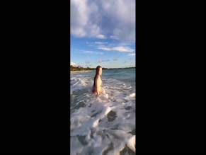 lenaa.stk: Showing ass with red bikini on the beach