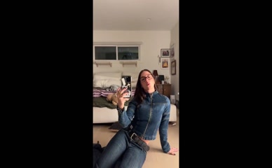 Mackenzie Ziegler in denim outfit lip-syncing.