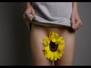 Cara Delevingne Sunflower Crotch Tease