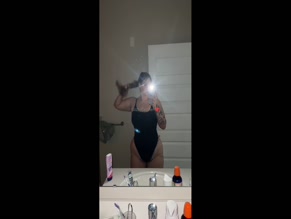 glizzycatcher in black one-piece swimsuit mirror selfie