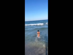 Danni Menzies bikini beach run