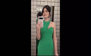 Jane Douglas green dress bathroom selfie.