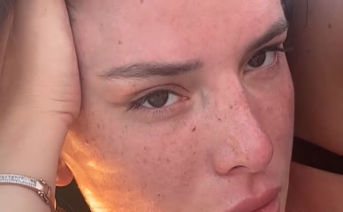 Bella Thorne bikini cleavage close-up.