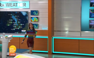 Laura Tobin's Sexy Legs and Leather Skirt