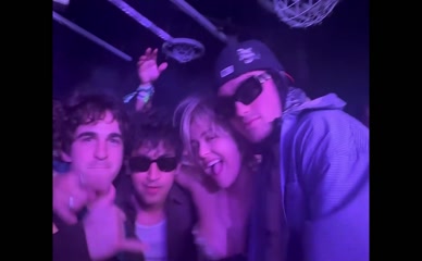 Emily Lind topless at a party