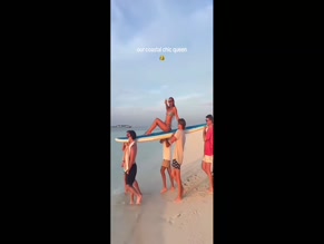 Millie Bobby Brown bikini beach carry