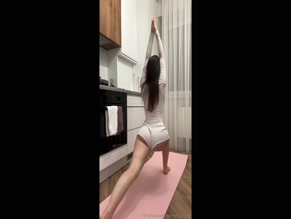 harmony_haze skin-tight shorts revealing full glute and thigh outline during stretches