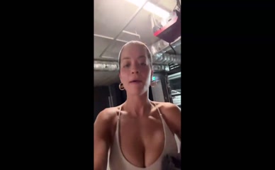 Rita Ora cleavage in sports bra
