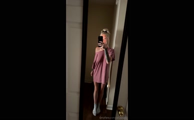 cal.paige2: wearing only an oversized top, legs fully exposed.