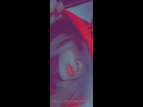 shawtycashinout facial close-up, red hood, bright lipstick