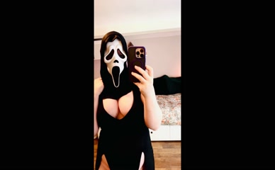 lucylincolnfree: Masked woman exposing large breasts