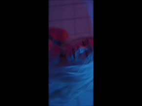 Explicit content: anyamazurock in lingerie, smoking, and posing in a shower.