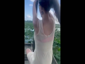 Lana Del Rey sexy dress no bra