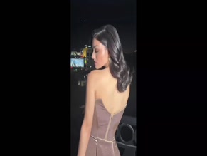 Rachel Zegler strapless dress cleavage