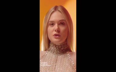 Elle Fanning nipple slip in sheer dress