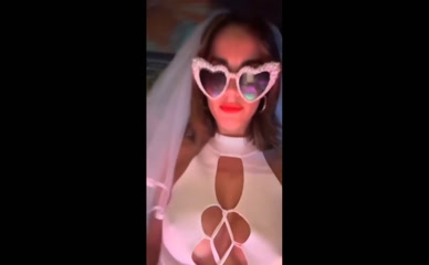 Georgia May Foote cleavage baring top.