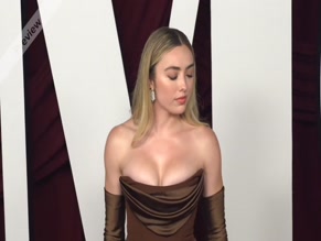 Peyton List cleavage dress