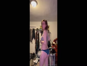 hipsandtits1 reveals pierced breasts in sports bra