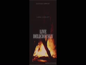 lara_free silhouette bent over by fire, promoting adult webcam platforms