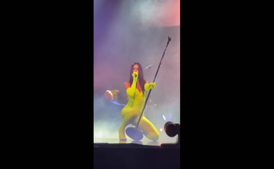 Dua Lipa neon bodysuit cameltoe.