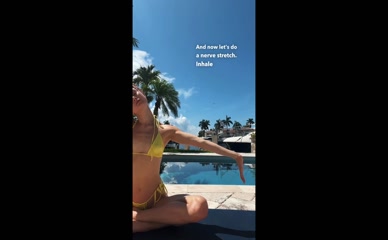 Marina Mazepa bikini neck stretches.