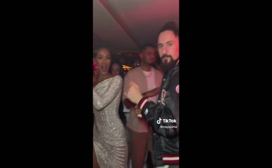 Maya Jama sideboob leg slit dress