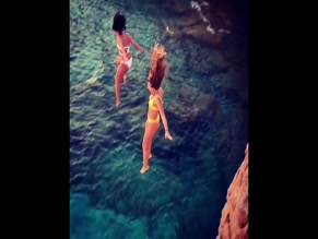 Marie Avgeropoulos cliff jump.