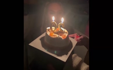 Dafne Keen blows out birthday candles.